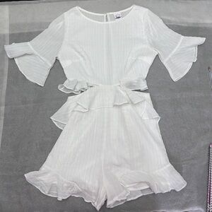Selfie Leslie White Ruffled Short Romper with cut-out sides and open back